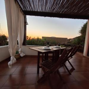 A balcony or terrace at Dammuso Surya Cloe