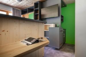 Kuchyň nebo kuchyňský kout v ubytování Base Aktivhotel Montafon