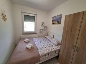 Postel nebo postele na pokoji v ubytování Holiday home Laura