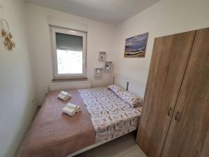 Postel nebo postele na pokoji v ubytování Holiday home Laura