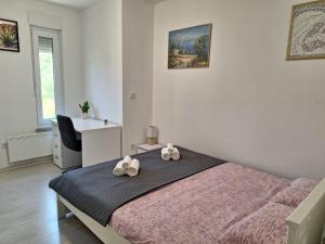 Postel nebo postele na pokoji v ubytování Holiday home Laura
