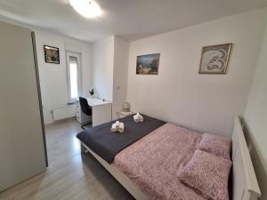 Postel nebo postele na pokoji v ubytování Holiday home Laura