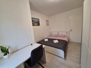 Postel nebo postele na pokoji v ubytování Holiday home Laura