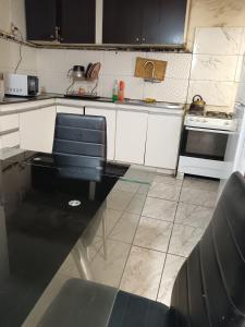 Kuchyň nebo kuchyňský kout v ubytování Habitación individual Privada