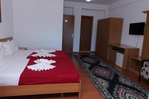 Postel nebo postele na pokoji v ubytování Vila Viktoria Golem
