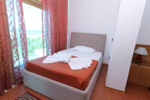 Postel nebo postele na pokoji v ubytování Vila Viktoria Golem