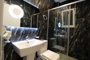 Koupelna v ubytování Hotel Keli