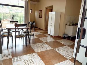 Kuchyň nebo kuchyňský kout v ubytování Loft Mundo Novo - A paz no coração da Mantiqueira