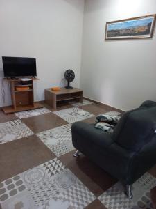 TV a/nebo společenská místnost v ubytování Loft Mundo Novo - A paz no coração da Mantiqueira