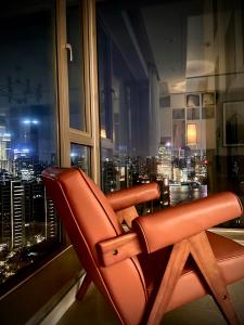 Ein Sitzbereich in der Unterkunft iHome-Lujiazui Riverside, Shanghai's Leading Advocate for Genuine Apart ment - Committed to Quality, Bund RiverView&CityWalk, Deluxe Neighborhood