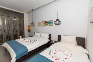 Elsewhere Hotel Inn North Street Branch客房内的一张或多张床位