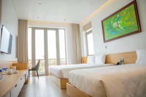 TV a/nebo společenská místnost v ubytování Min Min Hotel