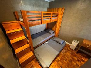 an overhead view of a bedroom with two bunk beds at 4BR Townhouse w Garage, Peaceful near Restaurants in Manila +66 photos