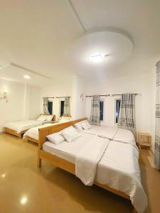 Katil atau katil-katil dalam bilik di 05 Đoàn Thị Điểm Hotel