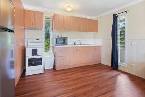 Kuchyň nebo kuchyňský kout v ubytování Emerald Lux Apartments 2 + 3 fotografie