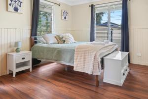 Letto o letti in una camera di Emerald Lux Apartments 2