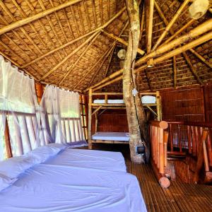 Postel nebo postele na pokoji v ubytování Señor Magallanes Farm and Resort