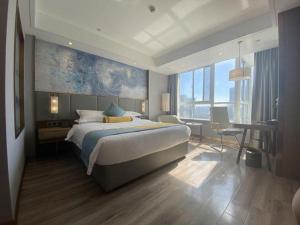 Postel nebo postele na pokoji v ubytování GreenTree Eastern Hotel Suqian Sihong Executive Center