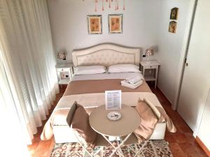 Postel nebo postele na pokoji v ubytování B&B Greco Home