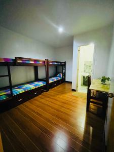 Postel nebo postele na pokoji v ubytování Tres Marias Place