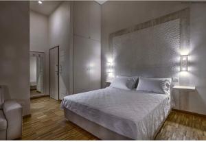 Postel nebo postele na pokoji v ubytování Muragie del Castello B&B
