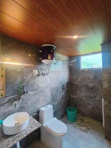 Ένα μπάνιο στο Aanagha Stay & cafe