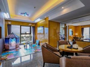 Posezení v ubytování Wanning Yingbin Hotel