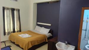 Koupelna v ubytování Hotel Orginal Residency