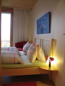 Postel nebo postele na pokoji v ubytování B&B Sunnesite Pratteln