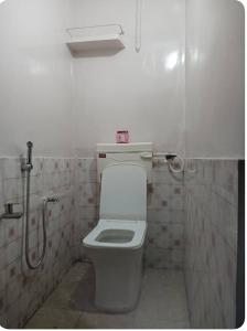 Koupelna v ubytování Ramaya Homestay
