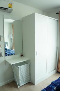 Ένα ή περισσότερα κρεβάτια σε δωμάτιο στο Baan Peang Ploen Huahin By Mayya +4 φωτογραφίες