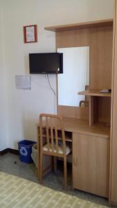 Kuchyň nebo kuchyňský kout v ubytování Albergo Moretti