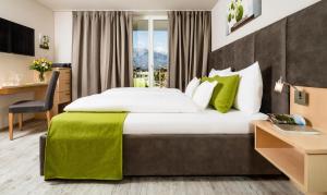 Postel nebo postele na pokoji v ubytování Hotel Pfeiss