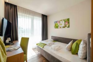 Postel nebo postele na pokoji v ubytování Hotel Pfeiss