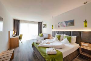 Postel nebo postele na pokoji v ubytování Hotel Pfeiss