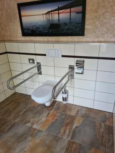 Koupelna v ubytování Perle Hotel