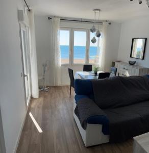 Posezení v ubytování Apartamento en el mar + 2 fotografie