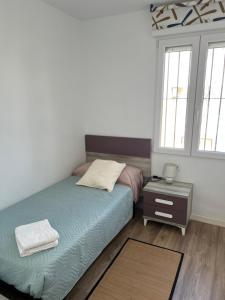 Postel nebo postele na pokoji v ubytování Apartamento en el mar