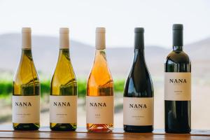 four bottles of wine sitting on a table at פטריוט -יקב ננה in Mitzpe Ramon