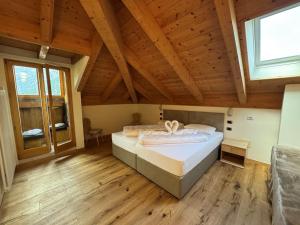 Postel nebo postele na pokoji v ubytování Hotel Savoia