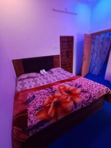 Ένα ή περισσότερα κρεβάτια σε δωμάτιο στο Atithi home stay and Cloud Kitchen