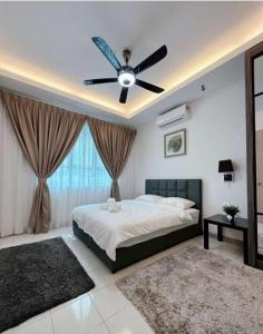 Ένα ή περισσότερα κρεβάτια σε δωμάτιο στο Bayustay City Kuala Terengganu Home