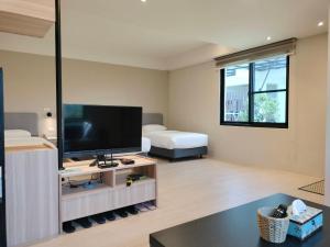 Sjónvarps- og/eða afþreyingartæki á Chao Zhou 86 B&B