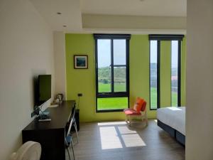 Sjónvarps- og/eða afþreyingartæki á Chao Zhou 86 B&B