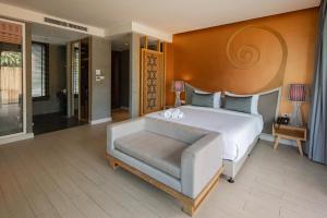 Voodi või voodid majutusasutuse The Tarna Resort, Koh Tao toas