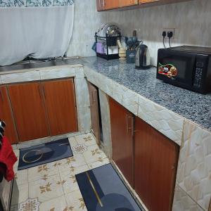 Η κουζίνα ή μικρή κουζίνα στο Mdm homes