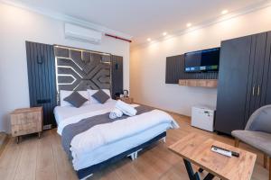Postel nebo postele na pokoji v ubytování Highway 34 Hotel