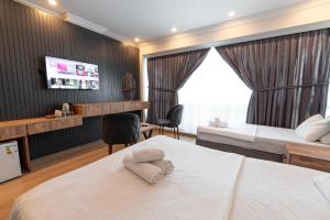 Postel nebo postele na pokoji v ubytování Highway 34 Hotel
