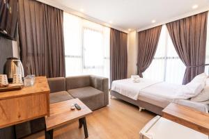 Postel nebo postele na pokoji v ubytování Highway 34 Hotel