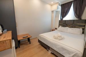 Postel nebo postele na pokoji v ubytování Highway 34 Hotel
